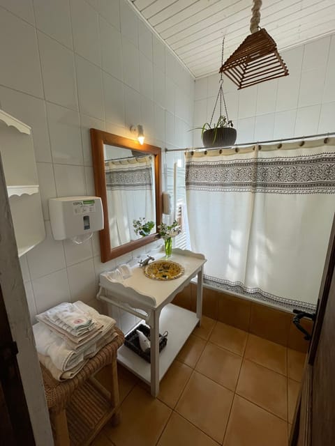 Standard Triple Room, Multiple Beds | Bathroom | Combined shower/tub, designer toiletries, hair dryer, towels