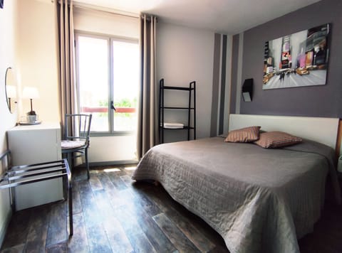 Desk, blackout drapes, soundproofing, iron/ironing board