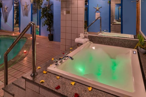 Dove Swimming Pool Suite with Private Heated Indoor Swimming, Jetted Tub & Fireplace | Bathroom | Separate tub and shower, jetted tub, free toiletries, hair dryer