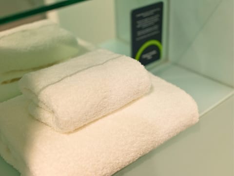 Select Comfort beds, desk, laptop workspace, blackout drapes