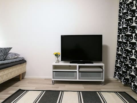 Standard Apartment, 1 Bedroom | Living room | Flat-screen TV