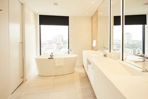 Premier Room, 2 Queen Beds, City View | Bathroom | Designer toiletries, hair dryer, bathrobes, slippers