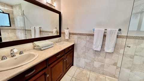 Standard Condo, Pool Access, Ground Floor | Bathroom | Free toiletries, hair dryer, towels
