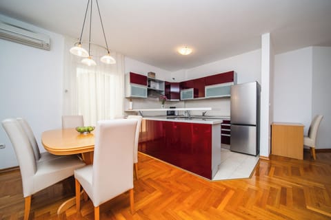 Comfort Apartment, 2 Bedrooms, Balcony (6 adults) | Private kitchen | Full-size fridge, microwave, stovetop, dishwasher