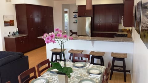 Dining table for 8 plus 4 seats at bar and fully stocked gourmet kitchen