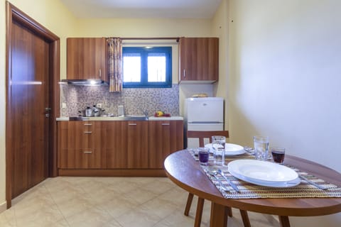 Elegant Apartment,  1 Bedroom, Sea View | Private kitchen | Fridge, stovetop, coffee/tea maker, electric kettle