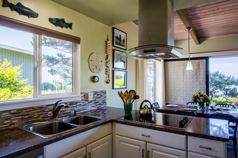 Clean modern efficiency, the kitchen is lovely.