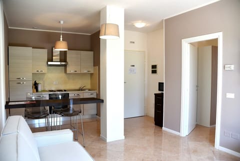 Apartment, 1 Bedroom | Living room | 24-inch flat-screen TV with cable channels, TV