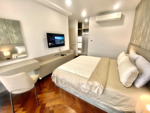 Premium Apartment, 3 Bedrooms, Non Smoking, Garden View | Minibar, desk, iron/ironing board, free WiFi