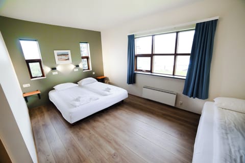 Standard Triple Room, 1 Bedroom, Private Bathroom | Desk, free WiFi, bed sheets, wheelchair access