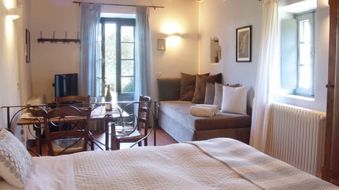 Junior Suite, Garden View | Premium bedding, down comforters, minibar, in-room safe