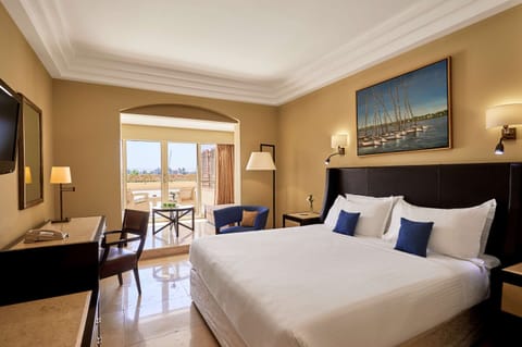 Deluxe Room, 1 King Bed (Nile View) | In-room safe, desk, blackout drapes, iron/ironing board