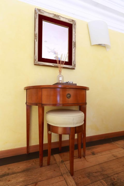 Superior Room | Minibar, in-room safe, individually decorated, individually furnished