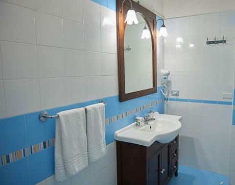 Deluxe Quadruple Room, Terrace | Bathroom | Rainfall showerhead, free toiletries, hair dryer, bidet