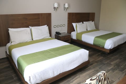 Executive Quadruple Room | Premium bedding, minibar, in-room safe, free WiFi