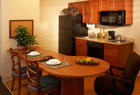 Suite, 1 Bedroom | Private kitchen | Fridge, microwave, dishwasher, coffee/tea maker