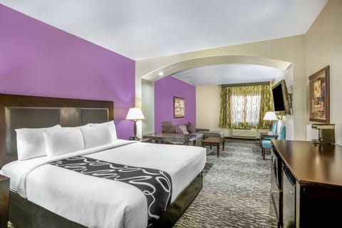 Deluxe Suite, 1 King Bed, Non Smoking | Premium bedding, desk, blackout drapes, iron/ironing board