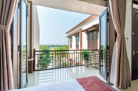 Deluxe Triple Room, Balcony, Garden View | View from room