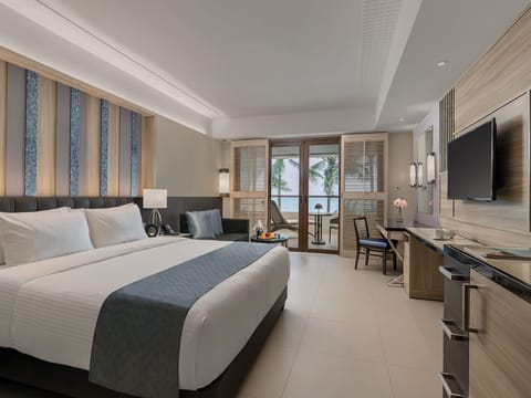 Grand Room, Beach View | Minibar, in-room safe, desk, iron/ironing board