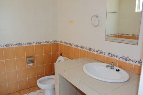 King Room, Private Bathroom | Bathroom | Shower, rainfall showerhead, hair dryer, slippers