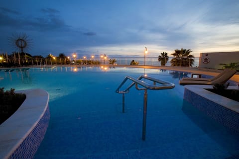 Indoor pool, outdoor pool, pool umbrellas, sun loungers