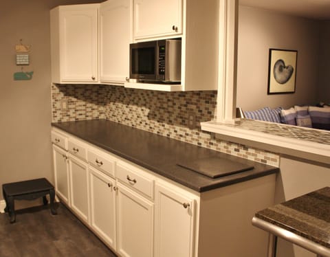 Other side of kitchen with additional 7 feet of counter space plus 4 ft island!