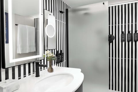 Premium Suite, 1 King Bed (Duplex) | Bathroom | Shower, designer toiletries, hair dryer, slippers