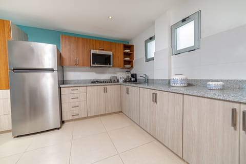 Apartment, 1 Bedroom, Ocean View | Private kitchenette | Mini-fridge, coffee/tea maker