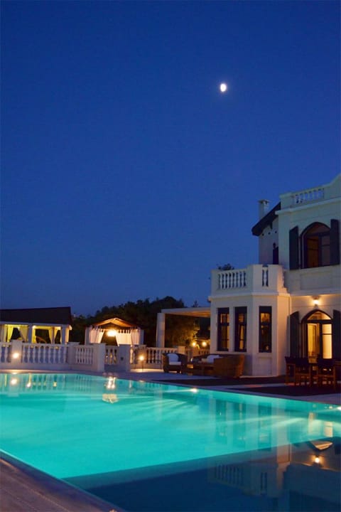 Outdoor pool, a heated pool, pool umbrellas, sun loungers