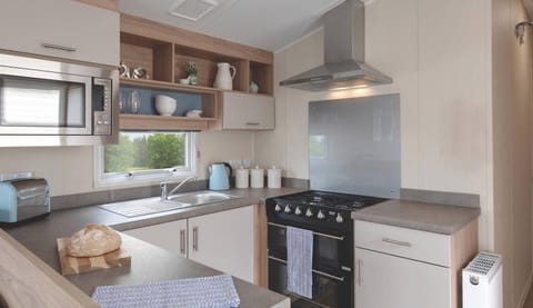 Classic Mobile Home, 2 Bedrooms | Private kitchen | Full-size fridge, microwave, oven, stovetop