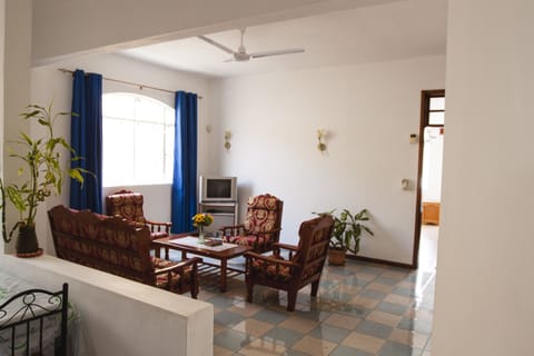 Economy Apartment, 1 Bedroom, Ensuite, Courtyard View | Living area | 32-inch flat-screen TV with digital channels, TV