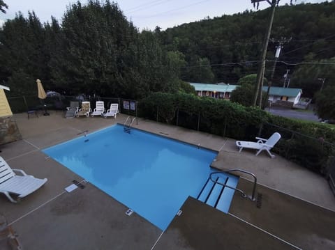 Outdoor pool, open 9:00 AM to 8:00 PM, sun loungers