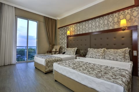 Double or Twin Room, Sea View | In-room safe, desk, free cribs/infant beds, free WiFi