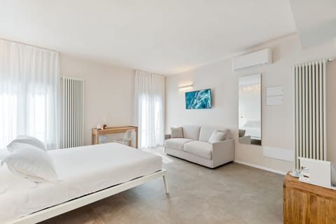 Luxury Suite, 1 King Bed, Sea View | Frette Italian sheets, premium bedding, memory foam beds, minibar