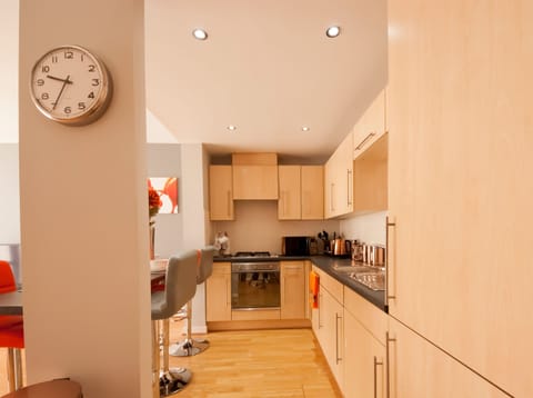 Apartment, 2 Bedrooms | Private kitchen | Full-size fridge, microwave, oven, coffee/tea maker