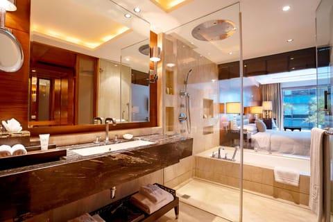 Deluxe Room, 1 King Bed | Bathroom | Separate tub and shower, deep soaking tub, designer toiletries