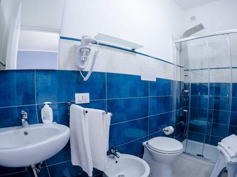 Triple Room, City View | Bathroom | Shower, free toiletries, hair dryer, bidet