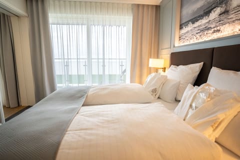 Junior Suite | Premium bedding, minibar, in-room safe, individually decorated