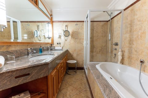 Suite | Bathroom | Separate tub and shower, deep soaking tub, free toiletries, hair dryer