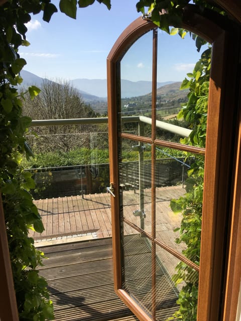 From the master bedroom out on to balcony and stair down to deck.