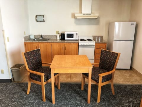 Fridge, microwave, coffee/tea maker, dining tables