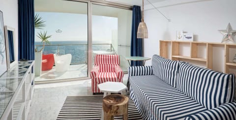 Suite, Sea View (2 Adults) | Blackout drapes, iron/ironing board, free WiFi, bed sheets