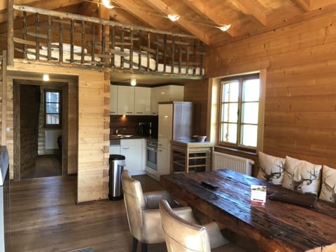 Luxury Chalet, 1 Bedroom, Fireplace, Pool View | Living area | Flat-screen TV