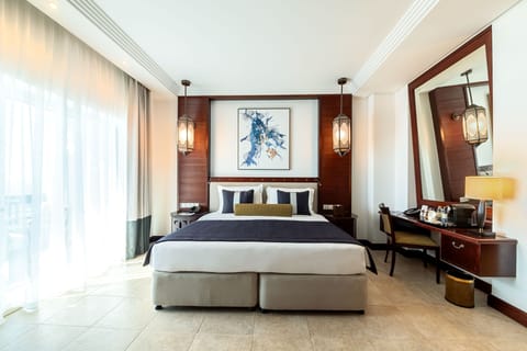Junior Suite, 1 King Bed, Sea View | Premium bedding, down comforters, minibar, in-room safe