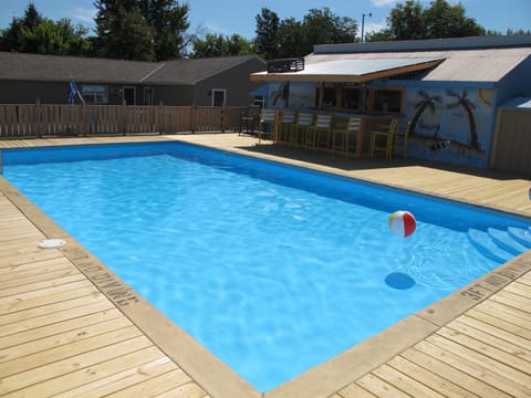 Seasonal outdoor pool, pool umbrellas, sun loungers