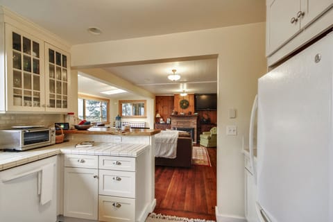 Open floorplan from the kitchen to the dining and living areas.