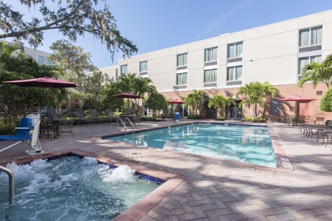 Outdoor pool, pool umbrellas, sun loungers