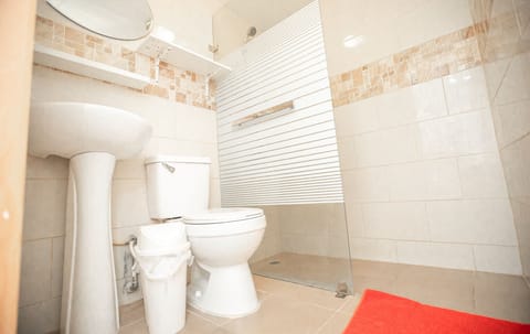 Family Triple Room, 1 Bedroom | Bathroom | Combined shower/tub, designer toiletries, towels, soap