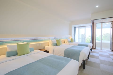 Triple Room, Multiple Beds, Partial Ocean View | In-room safe, soundproofing, free cribs/infant beds, free WiFi