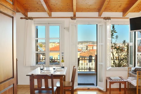 Studio, Terrace | Living area | Flat-screen TV